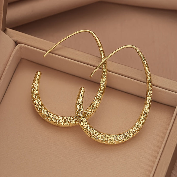 Raya | Aretes Minimalistas de Gota con Diseño Elegante