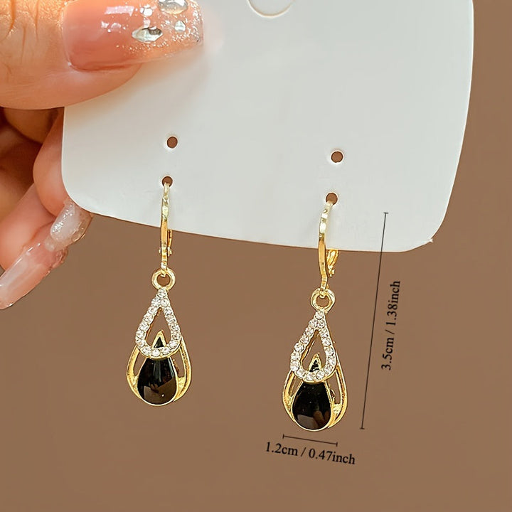 Ralia | Aretes de Gota Doble con Diseño Calado y Acabado Elegante