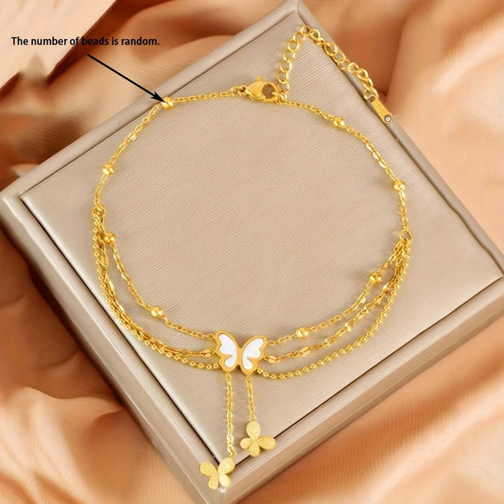 Brianna | Tobillera Bohemia de Tres Capas con Dijes y Cuentas Blancas