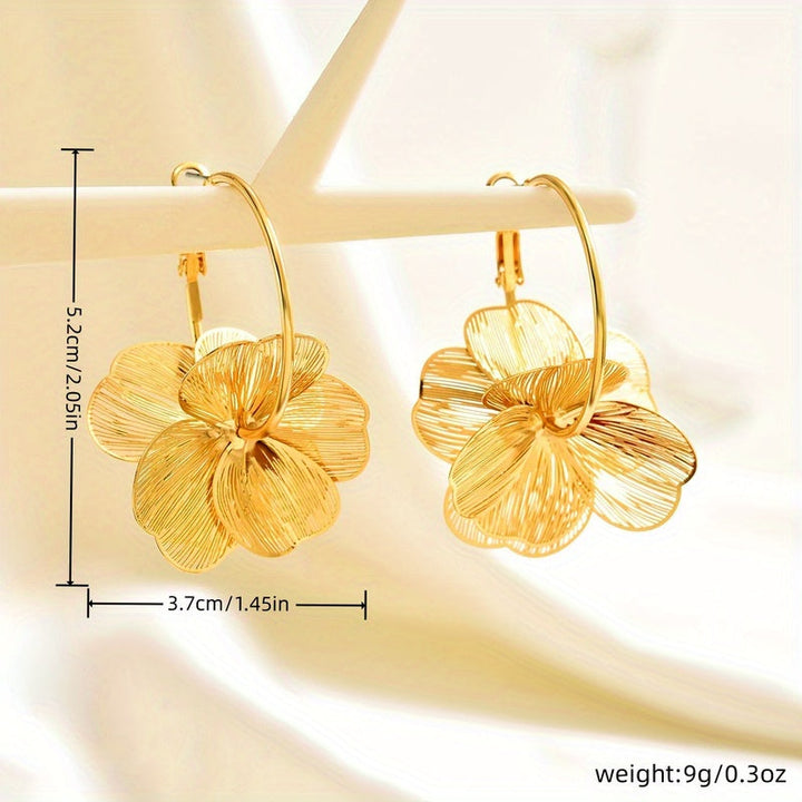 Selah | Aretes Dorados de Doble Aro con Diseño Moderno