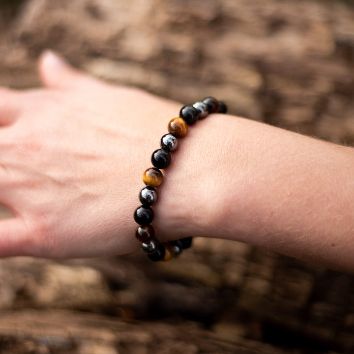 Caryra | Pulsera "3 Protecciones" en Ojo de Tigre, Hematites y Obsidiana Negra
