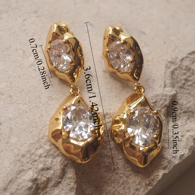 Xola | Aretes Colgantes con Zirconia Brillante y Diseño Elegante