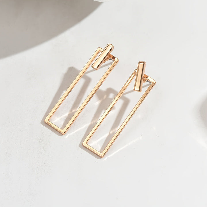 Quinleyra | Aretes Geométricos Largos con Acabado Metálico Elegante