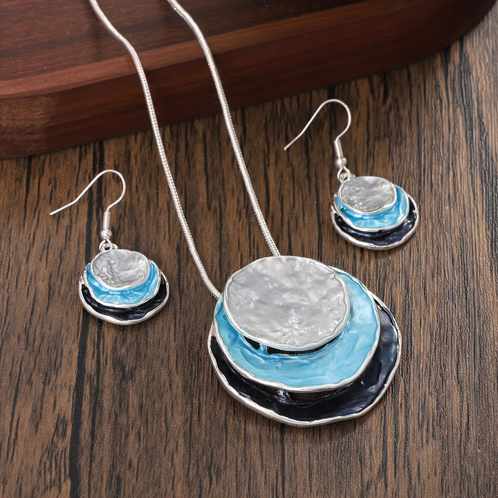 Vedae | Aretes Elegantes de Flor con Acabado Dorado y Perla