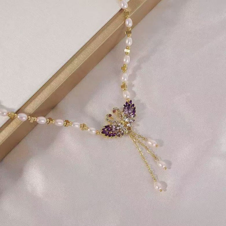 Winslow | Collar con colgante Cisne Doble en color púrpura